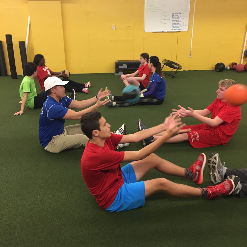 Medicine ball toss at the gym